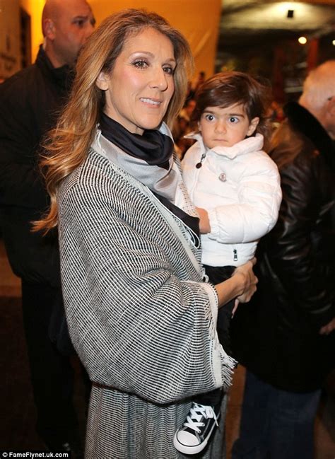 Celine Dion Nuzzles Her Son Eddy In Blanket Coat As The