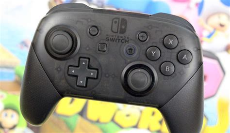 revised nintendo switch pro controller   spotted  stores