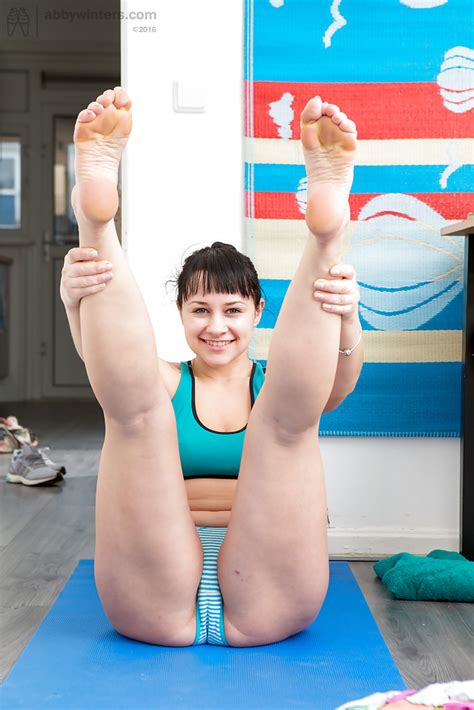 hot sportswoman strips naked and does the plank exercise