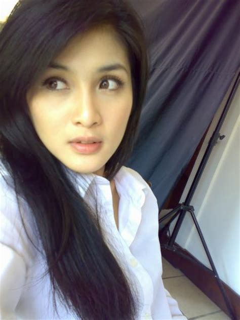 Indonesia’s Actress And Model Sandra Dewi Photos And