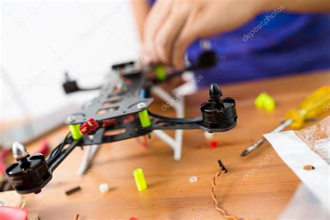 man  repair  drone stock photo  leungchopan