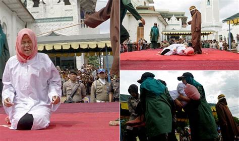 woman caned in public for having sex with male friend in indonesia