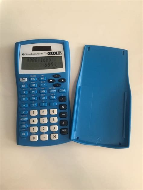 good condition blue calculator    minor scratches  calculator screen brand