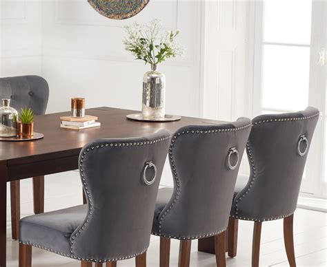 dark oak dining table   grey velvet chairs homegenies