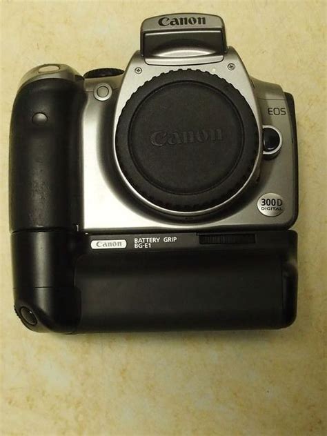 canon eos  battery grip  batteries chargeur catawiki