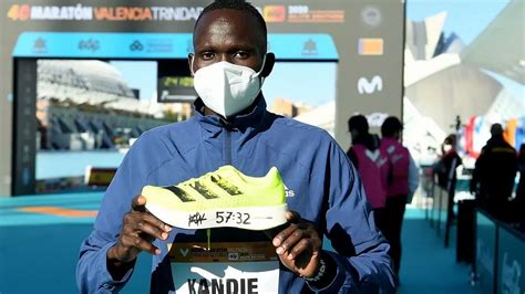 kibiwott breaks world half marathon record as world
