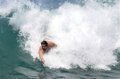 high surf warning  effect  waves    feet pound north shores