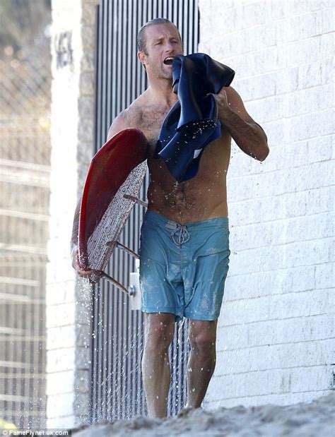 scott caan strips down to nothing but shorts after a surf