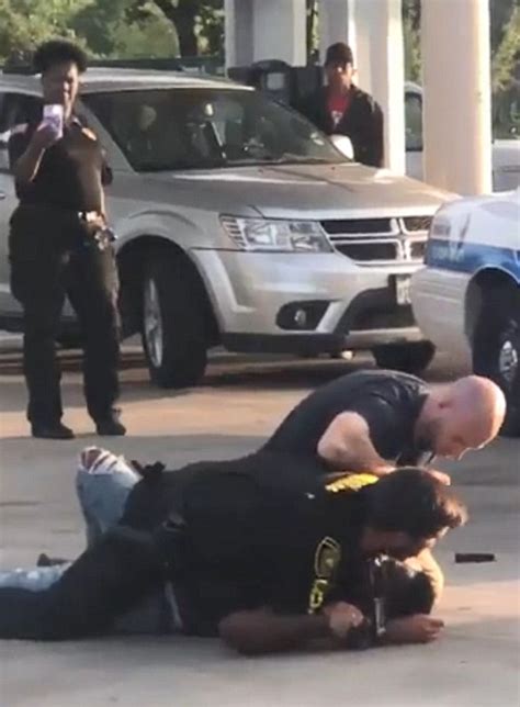 houston cop begs security guard to help him arrest suspect while she films him daily mail online