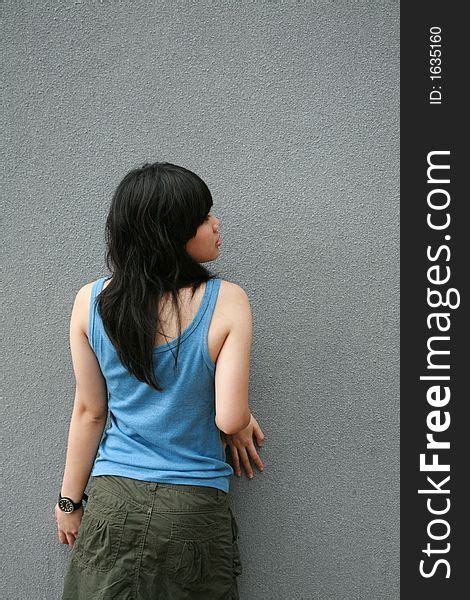 Asian Girl Touching Wall Free Stock Images And Photos 1635160