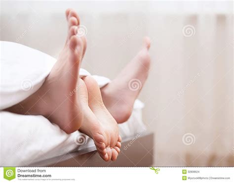 Couples Feet In Bed Stock Images Image 32808624