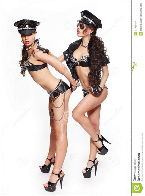 Two Beautiful Brunette Semi Nude Police Wome Stock Images