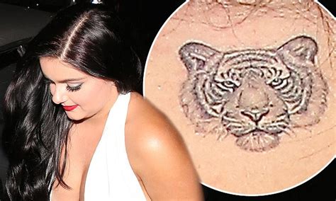 Ariel Winter Shows Off Tiger Tattoo In Low Cut White