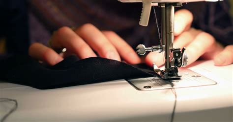 close  footage  woman sewing black stock footage sbv