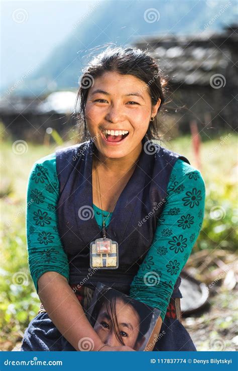 Young Nepalese Girl Hide From Her Mother In Durbar Square Editorial