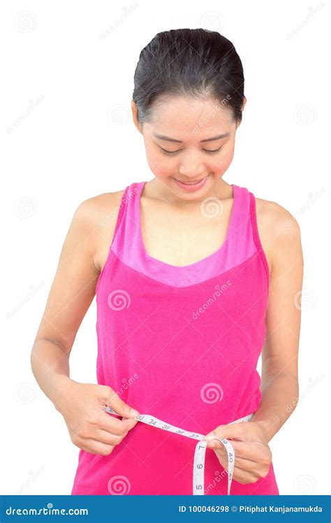 Beautiful Young Asian Girl Measuring Her Waistline With Measure Tape