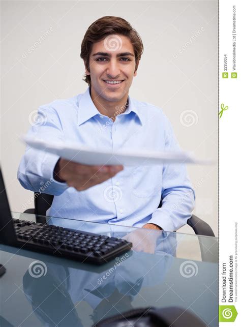 smiling businessman handing  paperwork stock images image