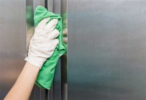 clean fingerprints   stainless steel refrigerator shiny modern