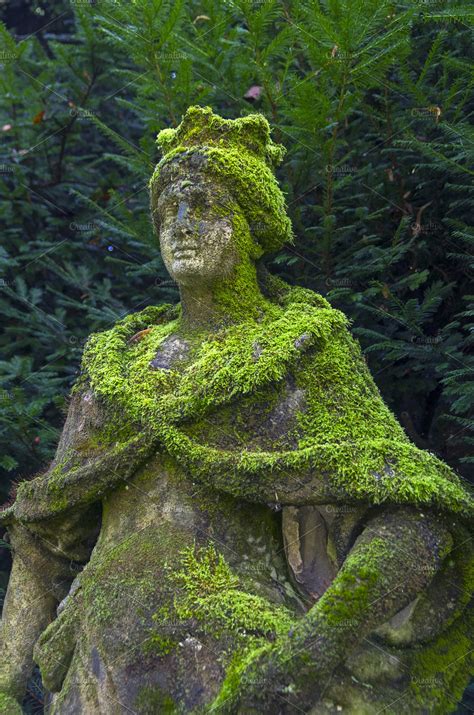 moss covered stone statue high quality arts entertainment stock  creative market