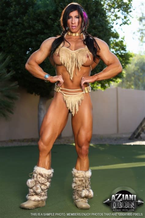 bodybuilder angela salvagno flexes her muscles in native american clothing
