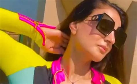 ameesha patel shares her glamorous video in bathing suit says soaking