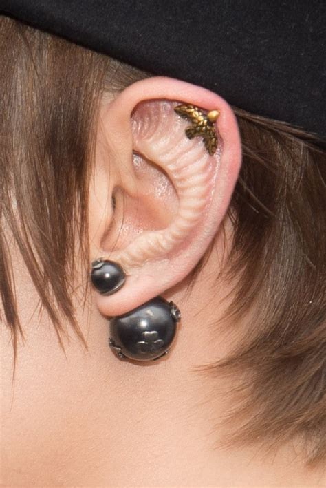 Cara Delevingne Sports Extreme Ear Modification At Paris Fashion Week