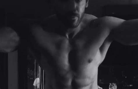 watch john abraham flaunting his abs in this shirtless video will make