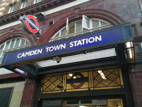 entrance  camden town station  blue  white  red letters   side