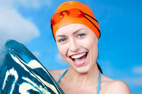 Joy Of A Victory A Winner Young Female Swimmer In An Orange Swimming