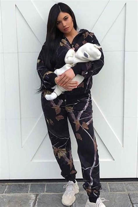 kylie jenner debuts baby stormi webster  extravagant mens tracksuit  magazine