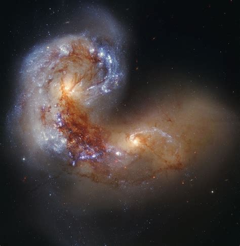 spiral galaxy ngc   collision visible   upper left ngc      normal