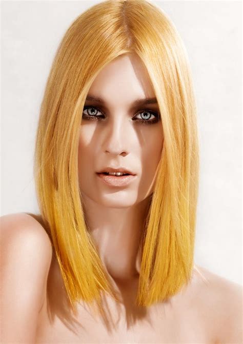 Medium Length Blonde Hair With Parted Bangs Hairstyles