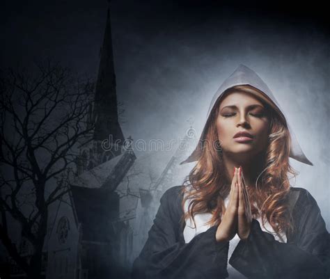 woman and spirituality portrait of catholic nun praying