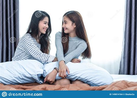 Two Asian Lesbian Women In Bedroom Couple People And Beauty Concept