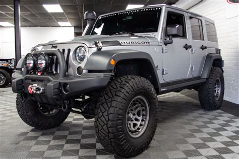 pre owned  jeep wrangler rubicon unlimited aev jk  jeep