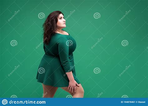 Plus Size Fashion Model In Green Dress Fat Woman On Green