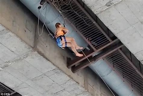 woman carries out the suspension base jump in southern russia daily mail online
