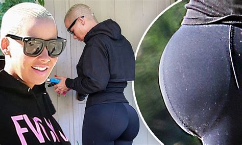 amber rose s butt pads can be seen under her tight