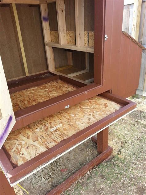 easy  clean chicken coop add latch     front baseboard  covering atop pegboard