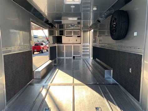 enclosed car hauler trailer  bull nose white ramp wells cargo