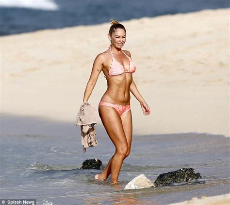 kym johnson shows off her toned figure as she hits the beach in miami