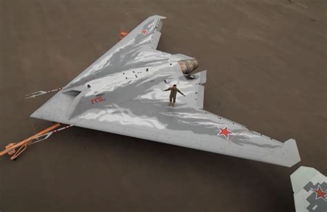 russias   okhotnik heavy stealth drone starts bashing ukrainian forces  kyiv desperately