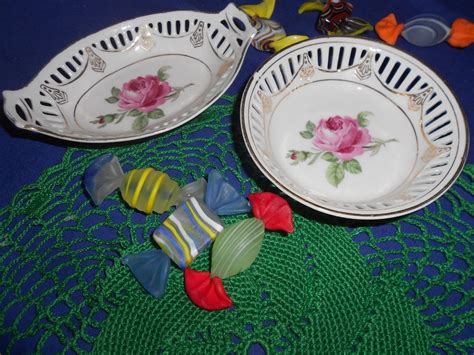 2 vintage porcelain dresser pin dishes w lattice border rose motif andgold accent