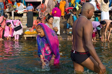 Hindu Pilgrims Bathing In River Ganges Varanasi India