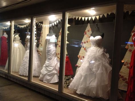 pin  elaina morrow  amys bridal boutique holiday window display