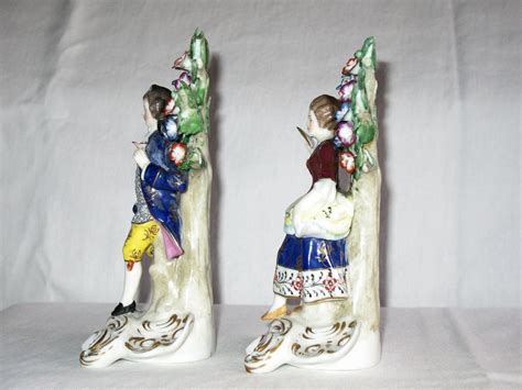 antique 19th century porcelain figure of gallant and lady from
