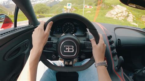 addictive bugatti chiron pov mountain drive video     warning label autoevolution