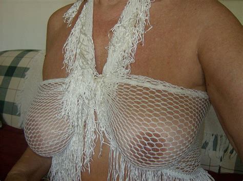 mature loves to show off her cleavage and tits 61 pics