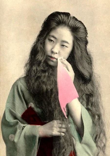 geisha with hair down richly oiled tresses flow down in