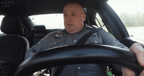 A Police Officer Dances In His Car When No One Is Looking S Primo